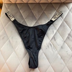 Never used shine strap thong Victoria’s Secret L (tags removed but never worn)